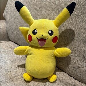 Pokemon Pikachu Yellow and Black talking and lights up Plush Toy